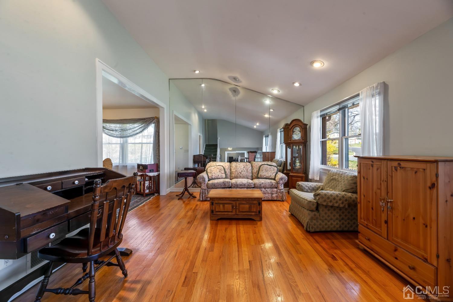 2 Perry Road East Brunswick, NJ 08816 - Photo 7 of 32 a living room with furniture and wooden floor