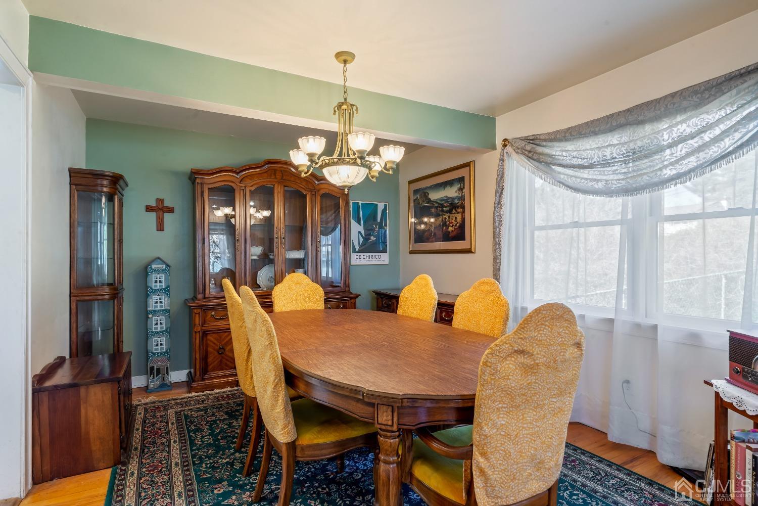 2 Perry Road East Brunswick, NJ 08816 - Photo 8 of 32 a view of a dining room with furniture and window