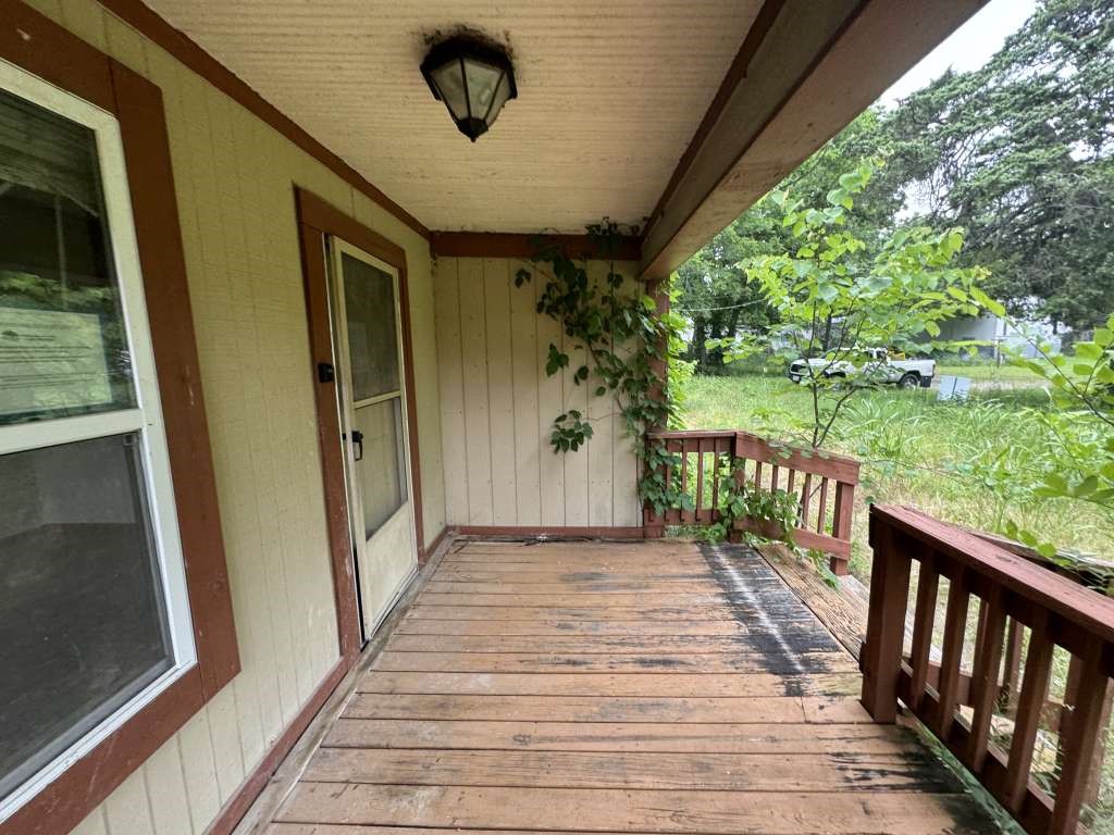 1515 Pilot Grove Road Whitewright, TX 75491 - Photo 2 of 13 a view of a porch