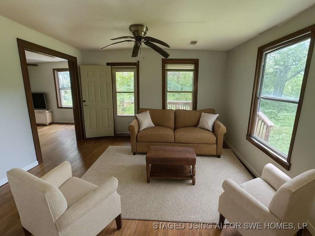 1515 Pilot Grove Road Whitewright, TX 75491 - Photo 5 of 11 a living room with furniture and a window
