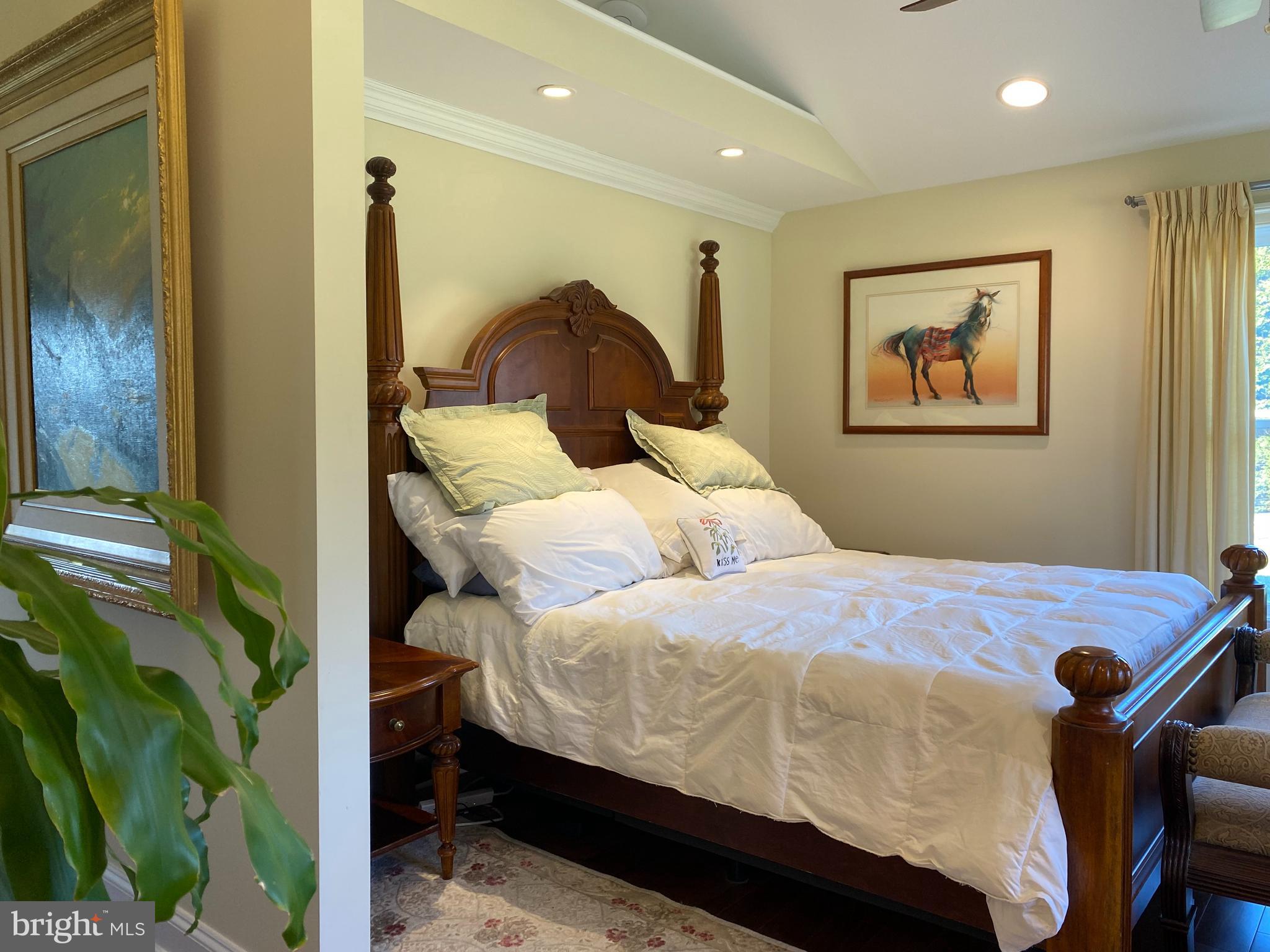 970 St George Barber Road Davidsonville, MD 21035 - Photo 15 of 69 a bedroom with a bed and a painting on the wall