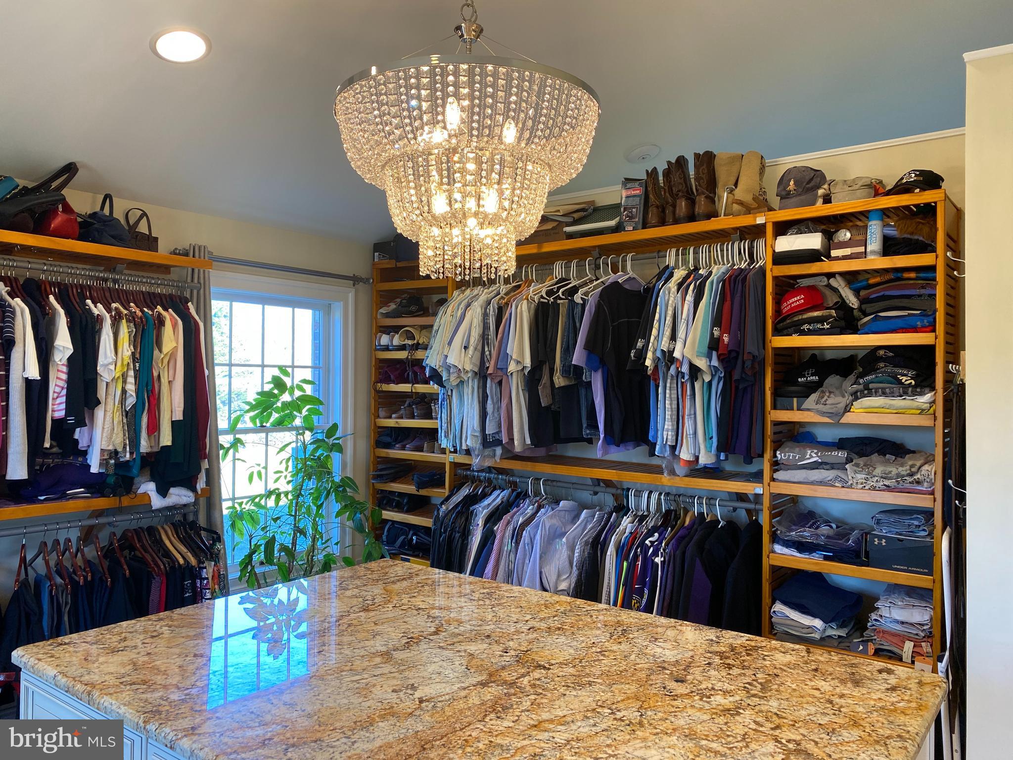970 St George Barber Road Davidsonville, MD 21035 - Photo 22 of 69 a view of walk in closet with clothes and shoes