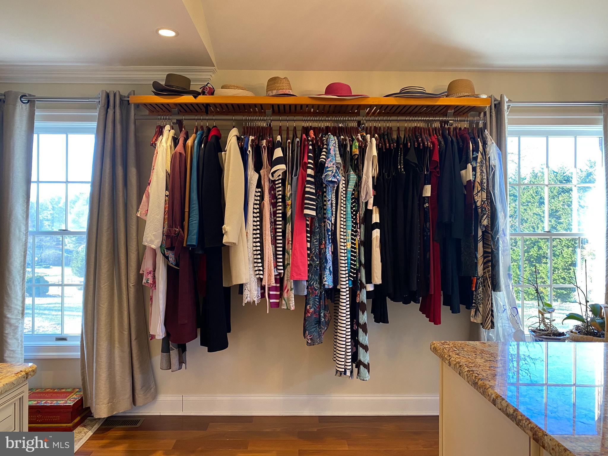 970 St George Barber Road Davidsonville, MD 21035 - Photo 25 of 69 a view of walk in closet with clothes and shoes