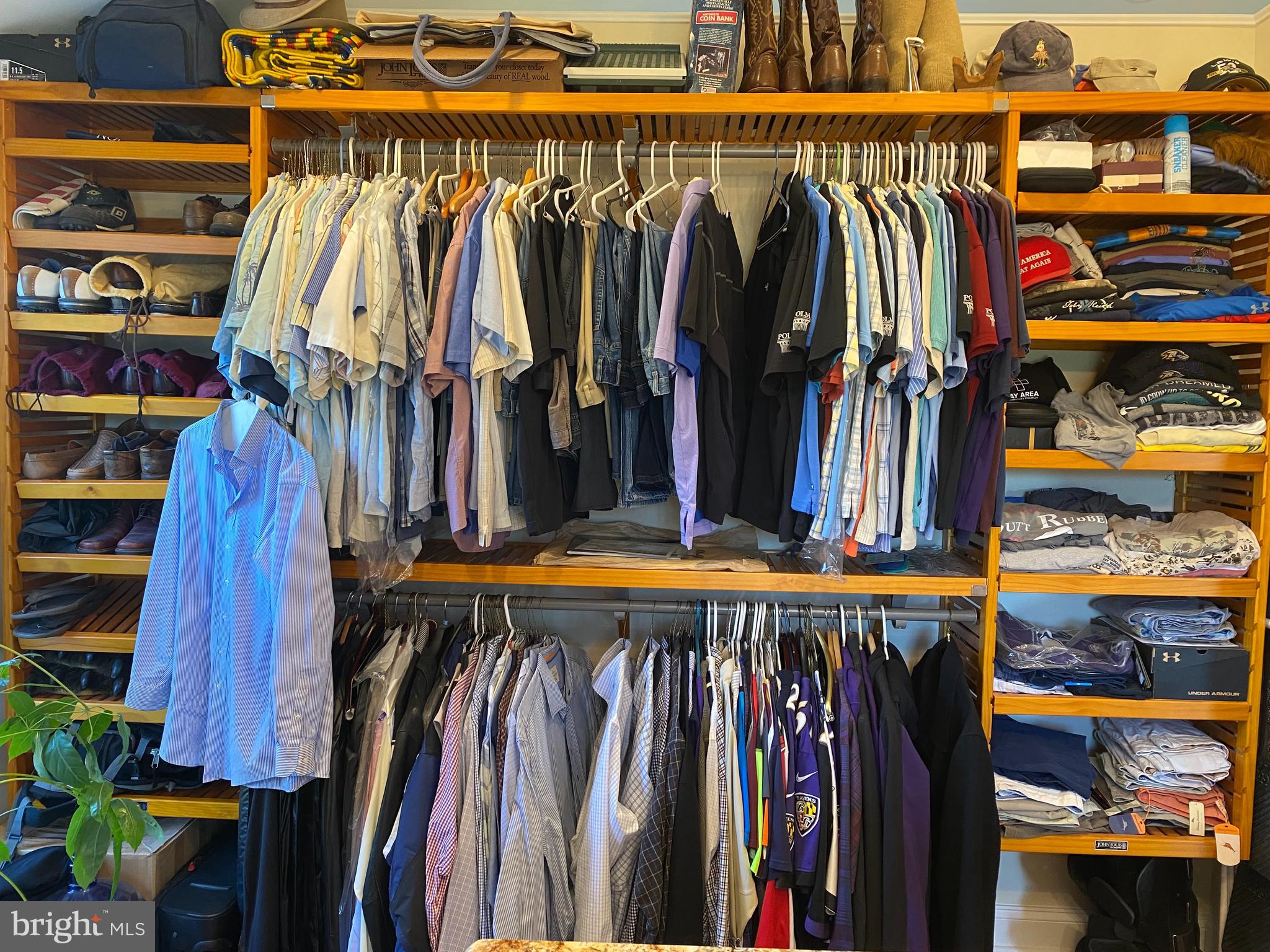 970 St George Barber Road Davidsonville, MD 21035 - Photo 26 of 69 a view of walk in closet with clothes and shoes