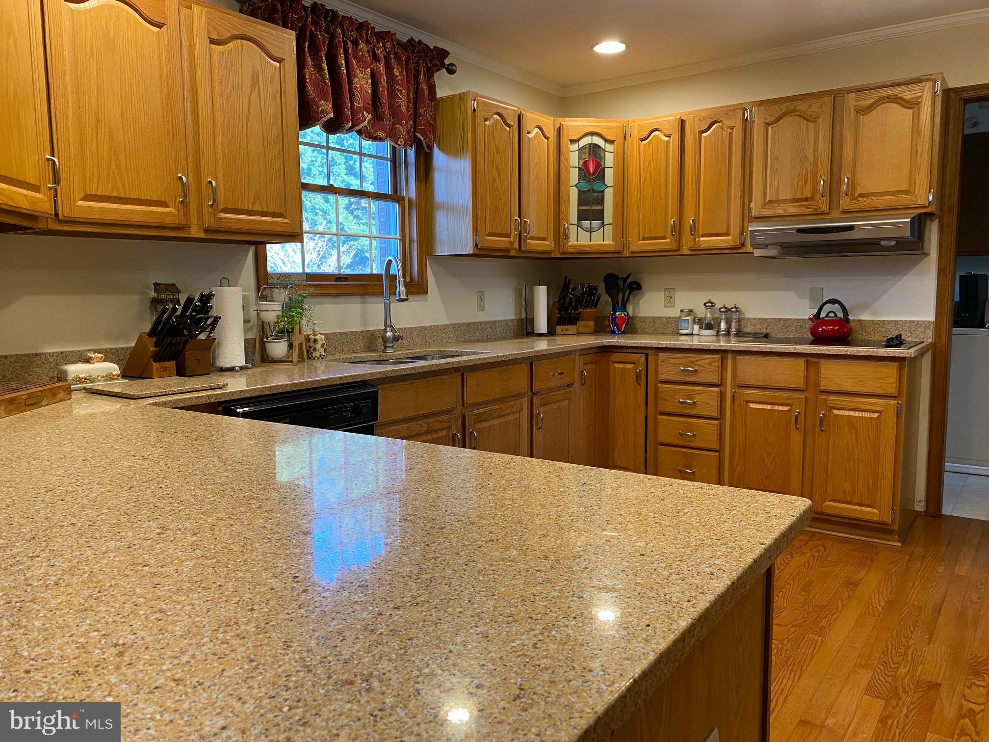 970 St George Barber Road Davidsonville, MD 21035 - Photo 34 of 69 a kitchen with stainless steel appliances granite countertop a sink and cabinets