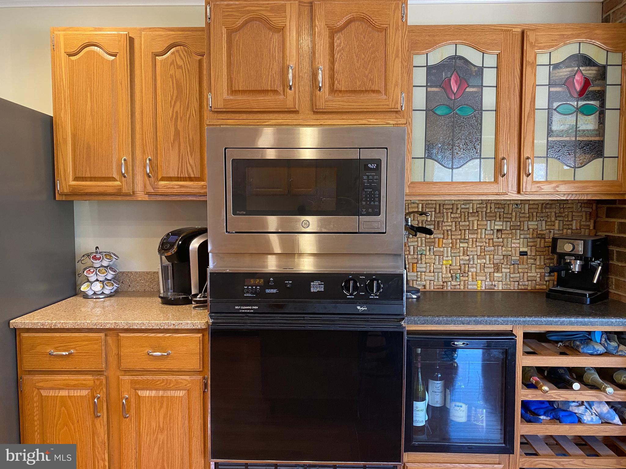 970 St George Barber Road Davidsonville, MD 21035 - Photo 35 of 69 a kitchen with stainless steel appliances granite countertop a stove and a microwave