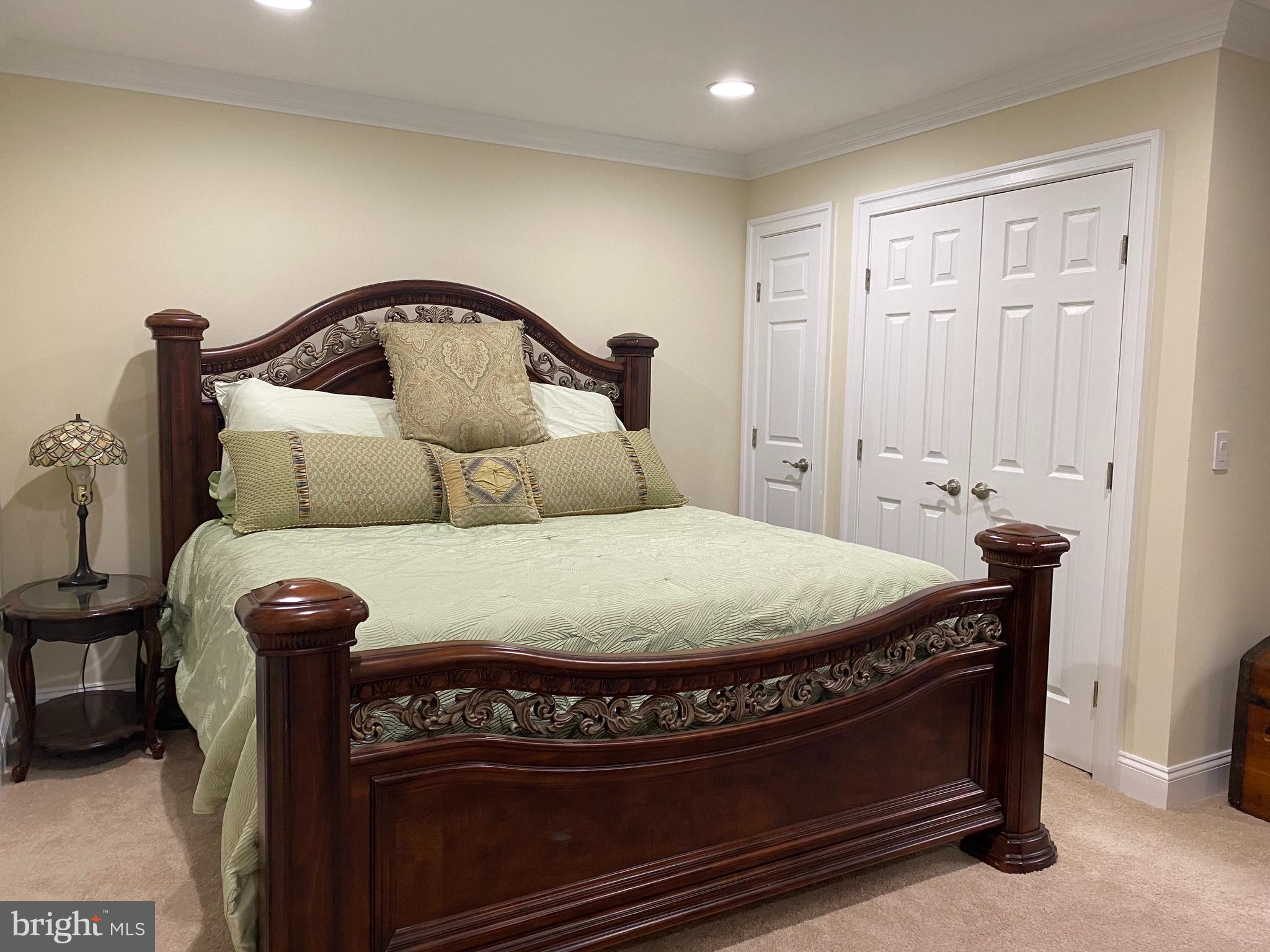 970 St George Barber Road Davidsonville, MD 21035 - Photo 45 of 69 a bedroom with a bed and a dresser