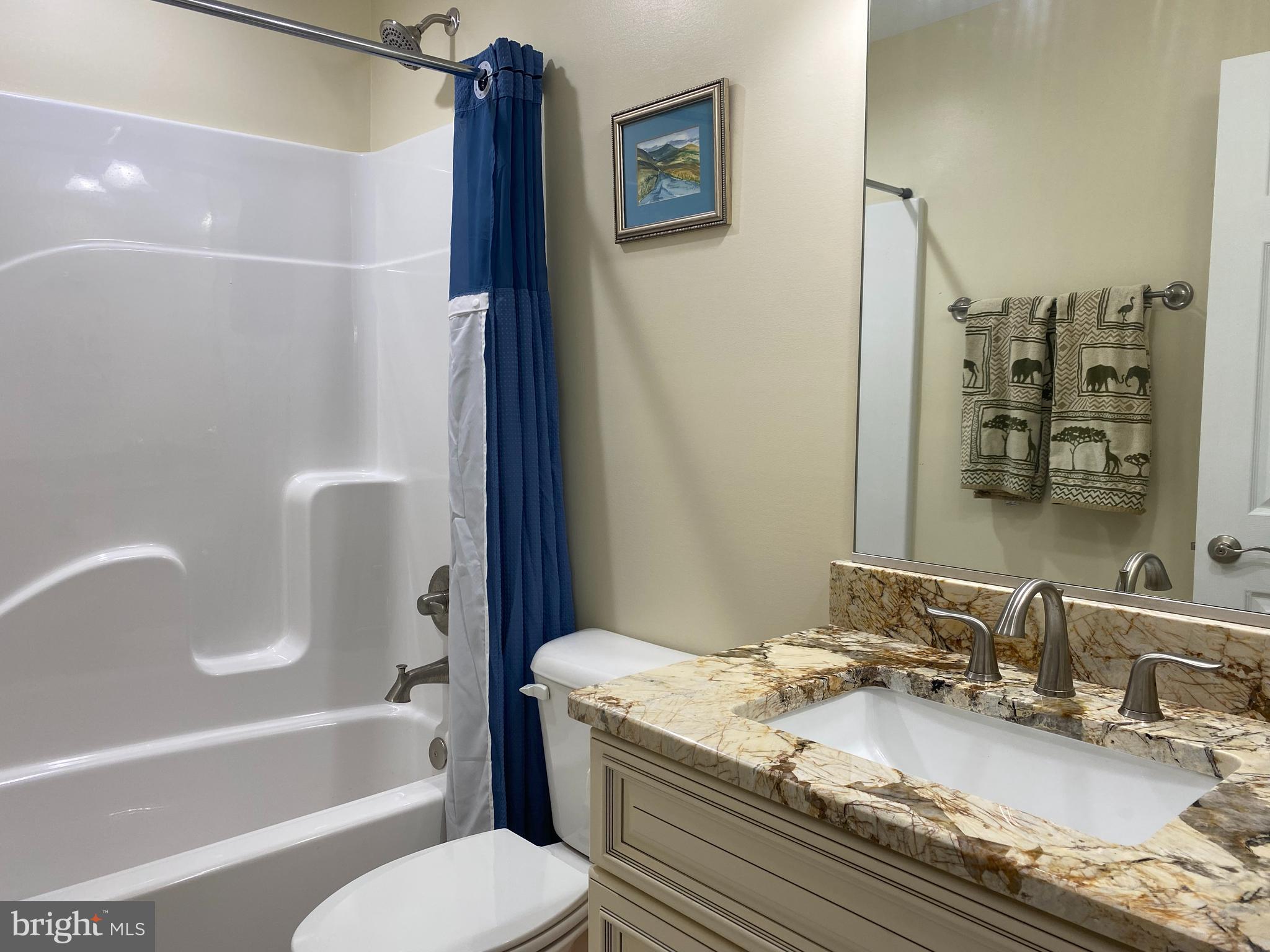 970 St George Barber Road Davidsonville, MD 21035 - Photo 48 of 69 a bathroom with a granite countertop sink toilet and shower