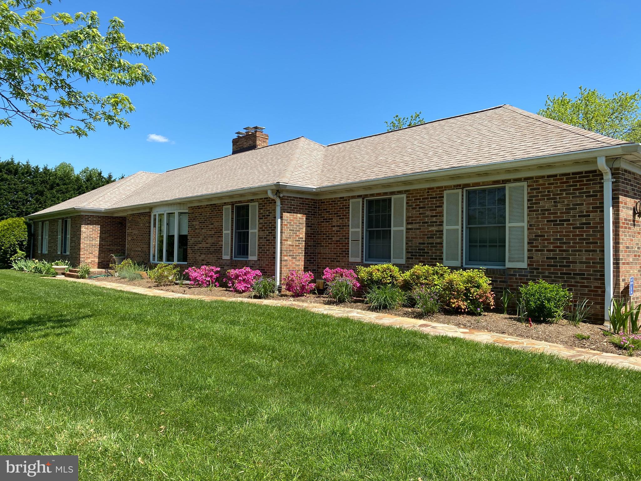 970 St George Barber Road Davidsonville, MD 21035 - Photo 5 of 69 a view of a house with a yard and potted plants