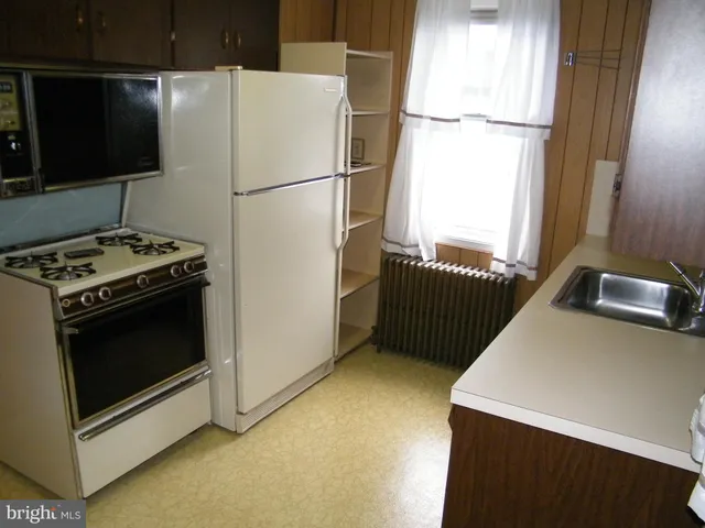 a utility room with washer and dryer