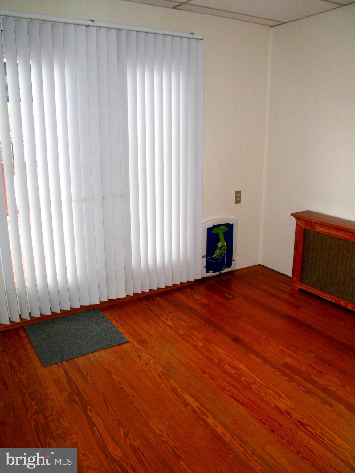 7602 Old Harford Road Parkville, MD 21234 - Photo 19 of 48 a bedroom with a bed and a window