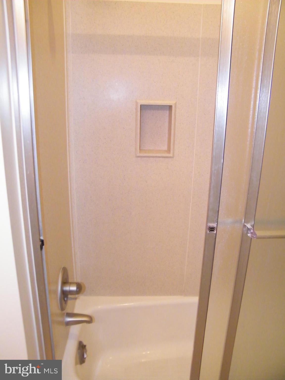 7602 Old Harford Road Parkville, MD 21234 - Photo 29 of 48 a bathroom with a bathtub