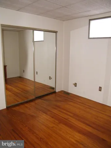 a view of room and wooden floor