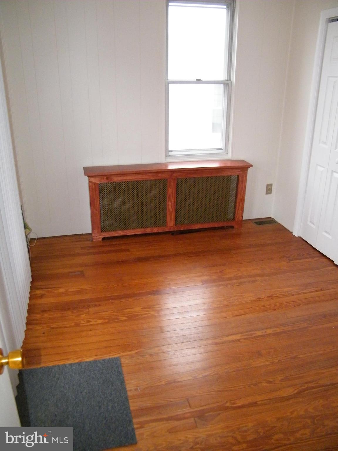 7602 Old Harford Road Parkville, MD 21234 - Photo 5 of 48 a view of an empty room with a window
