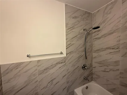 a bathroom with a bathtub