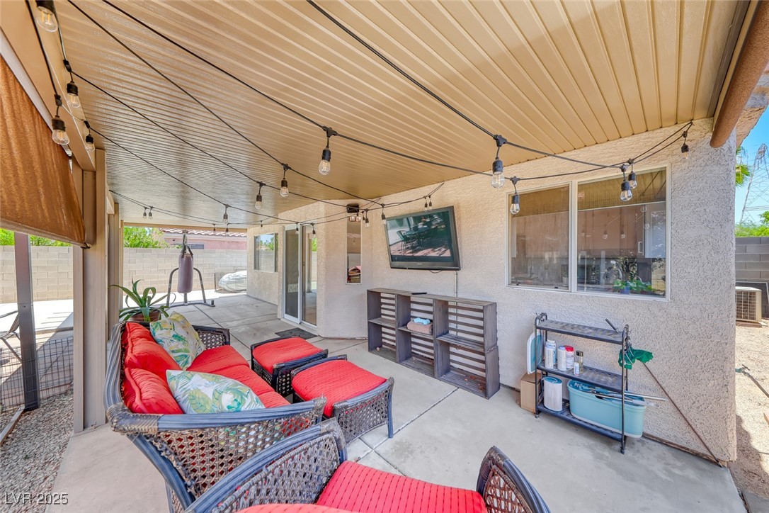 990 Ridge Path Avenue Henderson, NV 89015 - Photo 27 of 41 View of patio / terrace featuring an outdoor hangout area