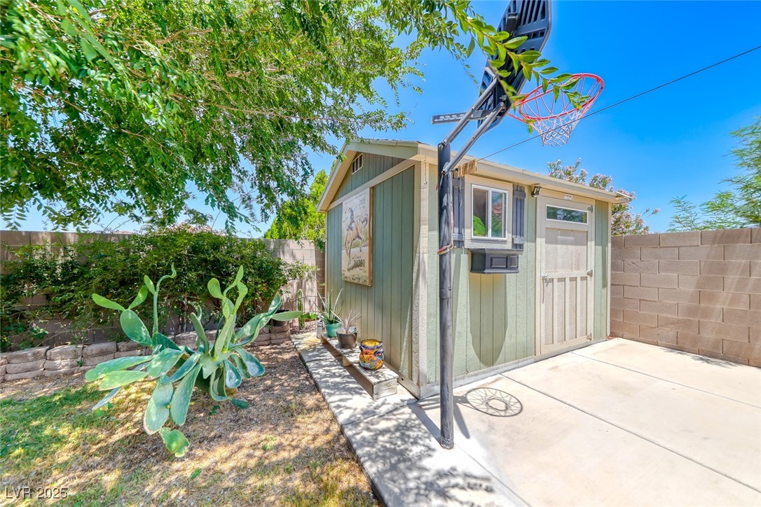 990 Ridge Path Avenue Henderson, NV 89015 - Photo 28 of 41 View of shed with a fenced backyard