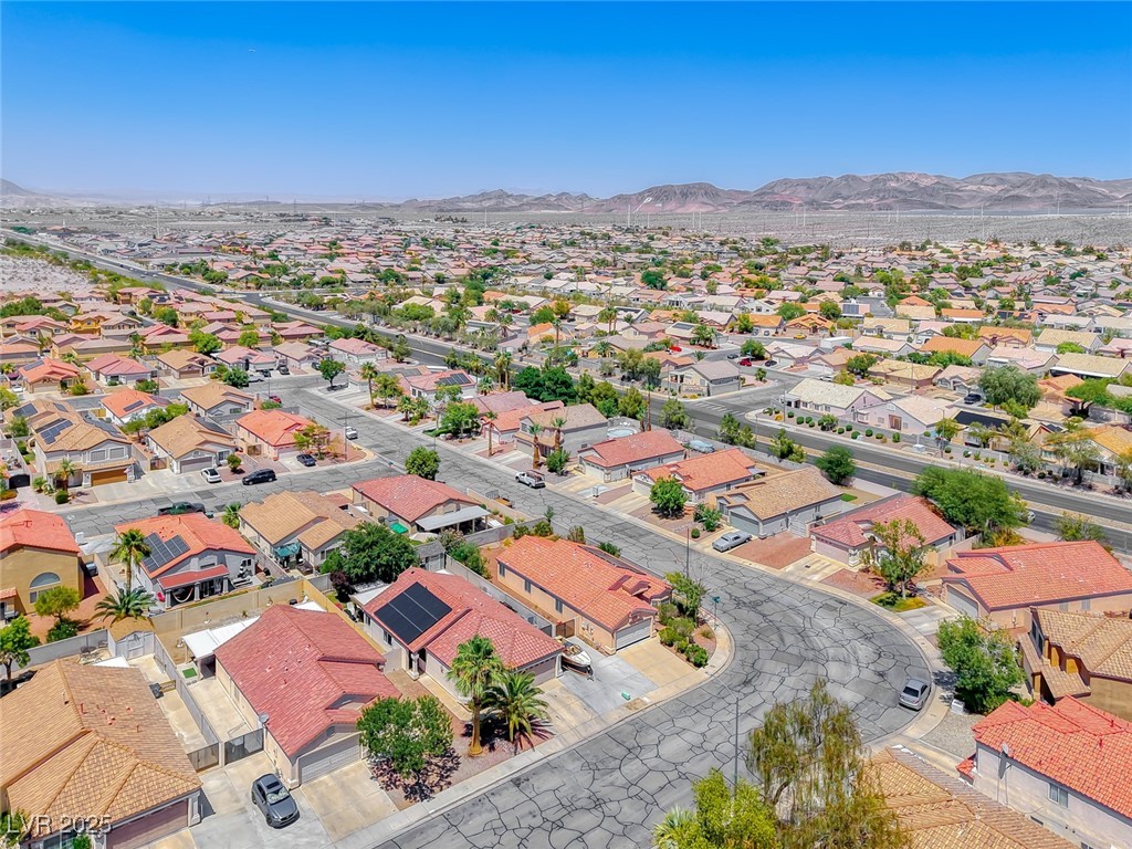 990 Ridge Path Avenue Henderson, NV 89015 - Photo 35 of 41 Aerial view of residential area featuring mountains