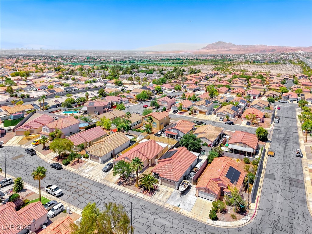 990 Ridge Path Avenue Henderson, NV 89015 - Photo 7 of 41 Aerial view of residential area with mountains