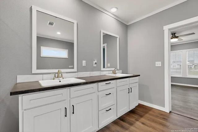 a bathroom with a sink and a toilet