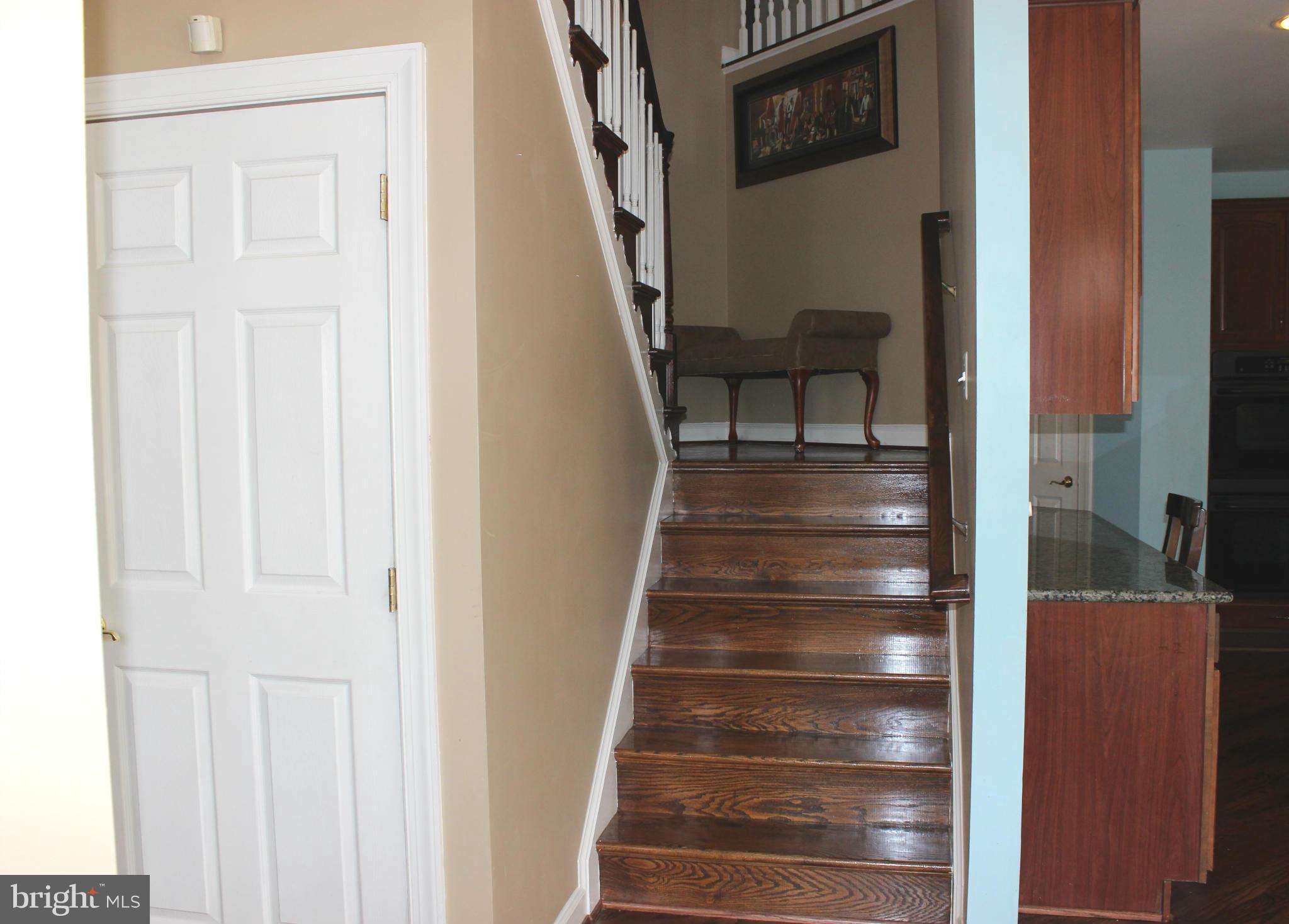 18519 Kerill Road Triangle, VA 22172 - Photo 14 of 27 Dual Staircase from kitchen