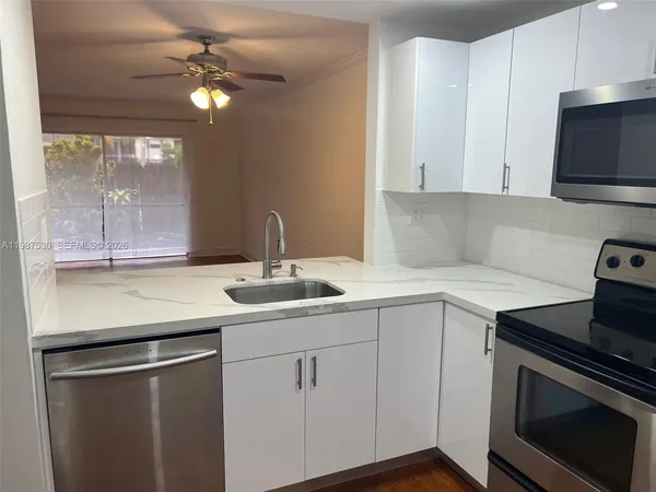 a view of a street view from a balcony