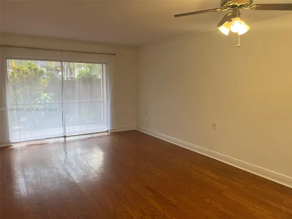 a bathroom with a sink and a large window