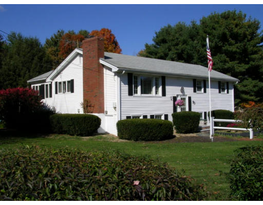 70 Proctor Road Chelmsford, MA 01824 - Photo 1 of 17 a front view of a house with a yard