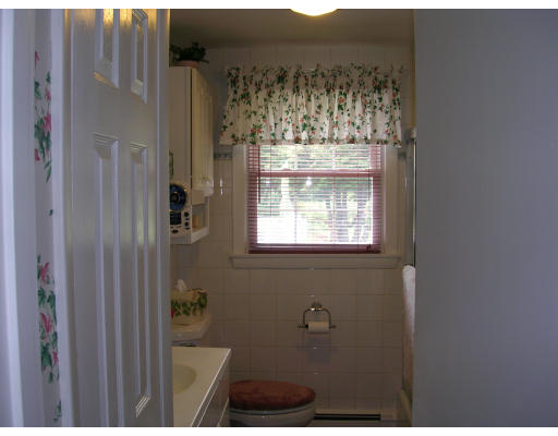 70 Proctor Road Chelmsford, MA 01824 - Photo 10 of 17 a bathroom with a bathtub and shower