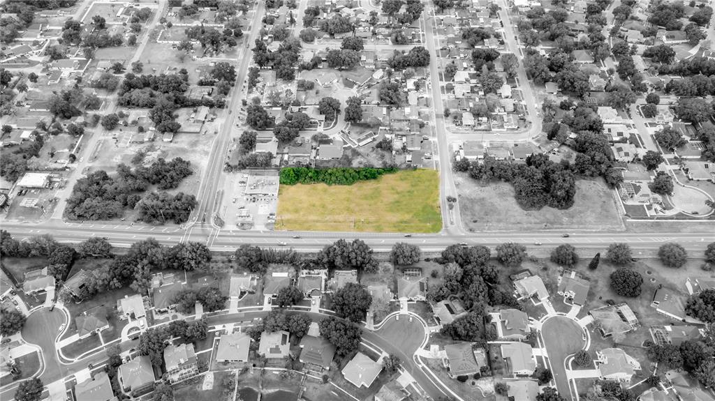 1414 East Silver Star Road Ocoee, FL 34761 - Photo 3 of 5 a view of a yard with wooden fence