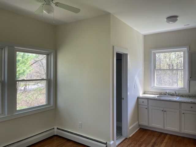 58 Wheeler Road, Unit 4 Rhinebeck, NY 12572 - Photo 5 of 6 an empty room with windows and closet