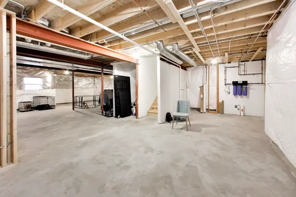 a view of a room with wooden walls