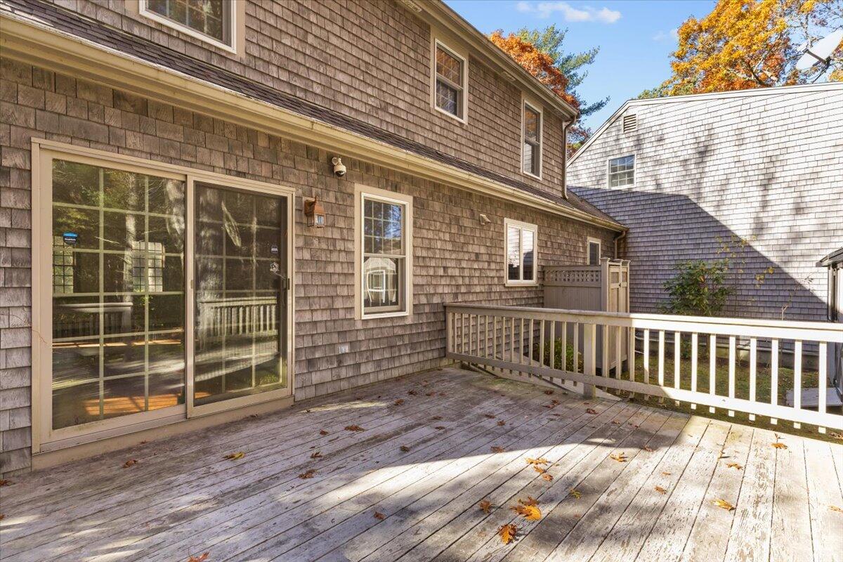 515 County Road Pocasset, MA 02559 - Photo 16 of 66 a view of a brick house with large windows