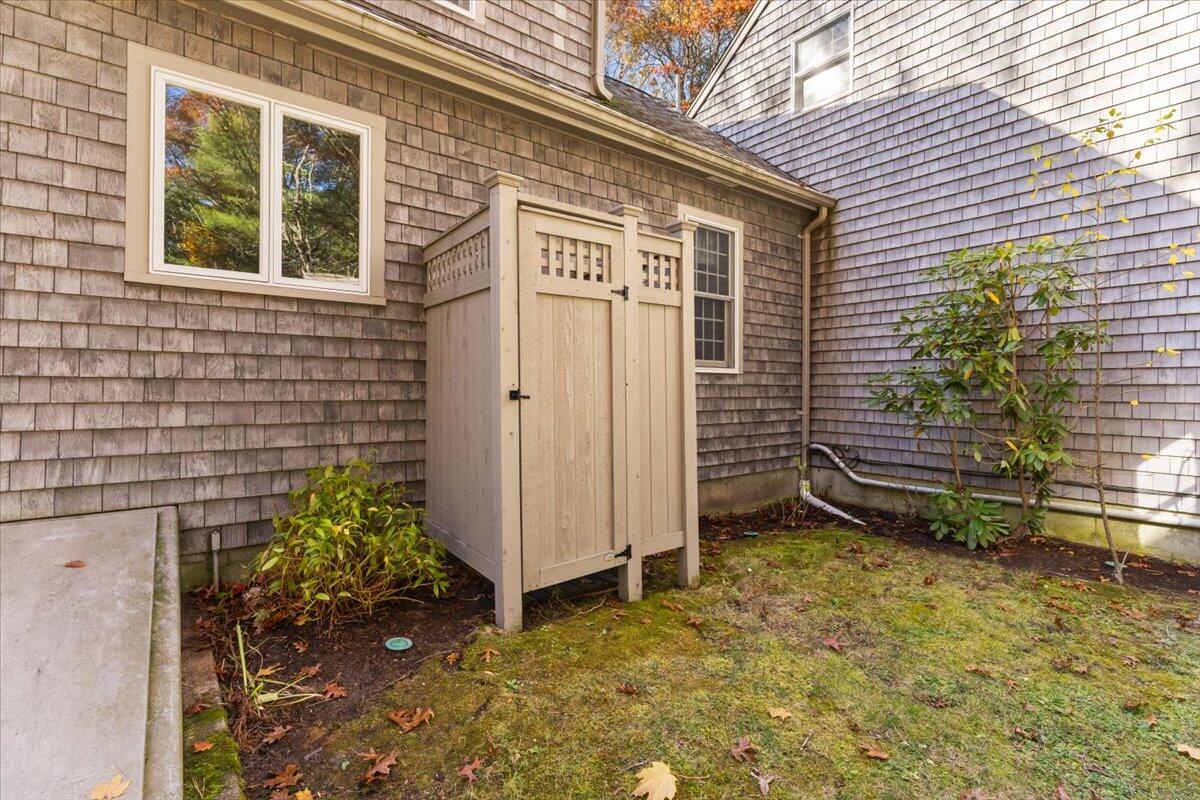 515 County Road Pocasset, MA 02559 - Photo 18 of 66 a view of a backyard with plants and entertaining space