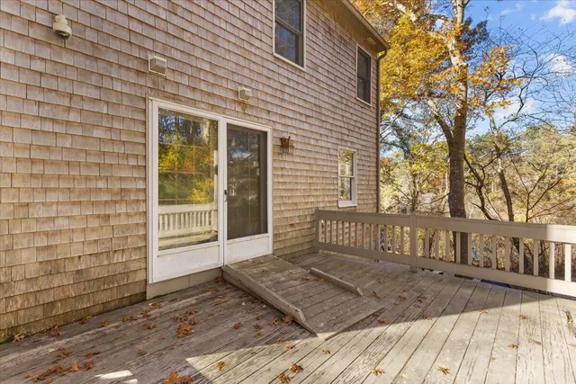 a view of an empty room and fire place