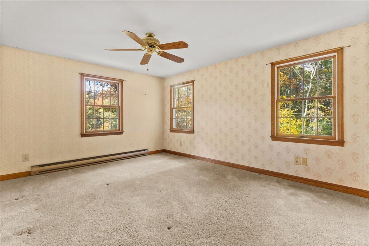 515 County Road Pocasset, MA 02559 - Photo 62 of 66 a view of an empty room with a window