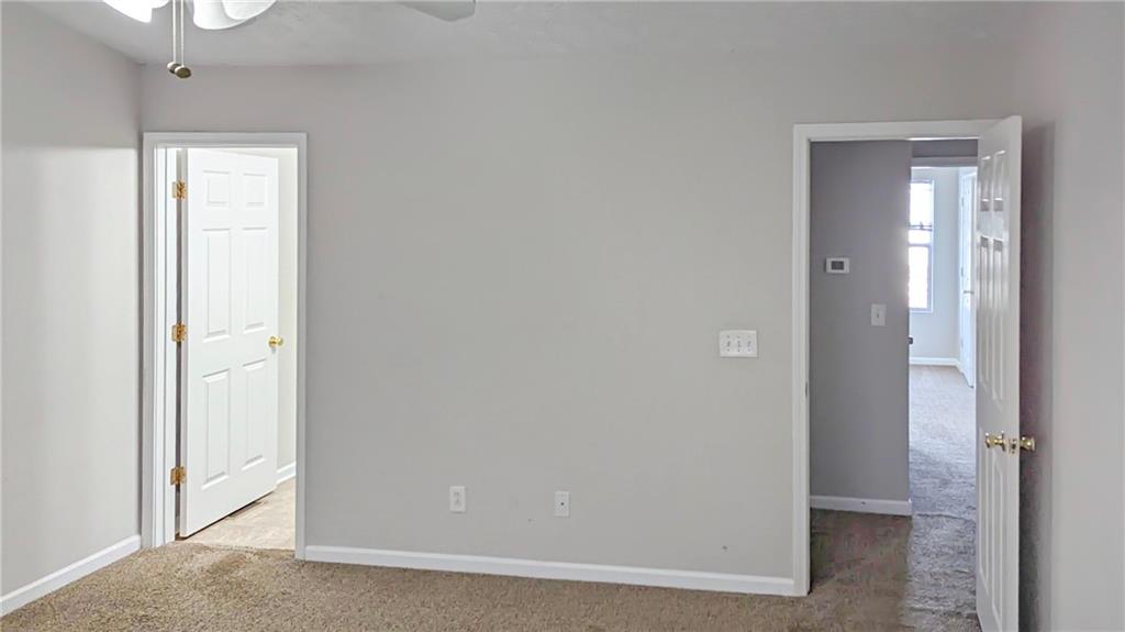 5737 Strathmoor Manor Circle Lithonia, GA 30058 - Photo 8 of 14 a view of a small space with wooden floor