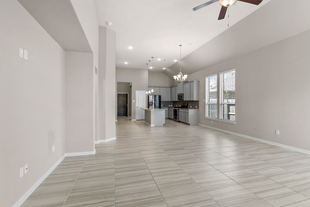 2666 Cedar Path Lane Conroe, TX 77385 - Photo 14 of 22 a view of an empty room and kitchen view