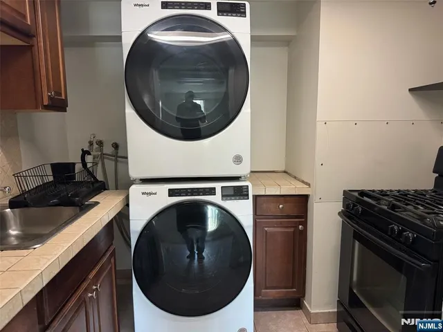 a kitchen with a stove and a sink