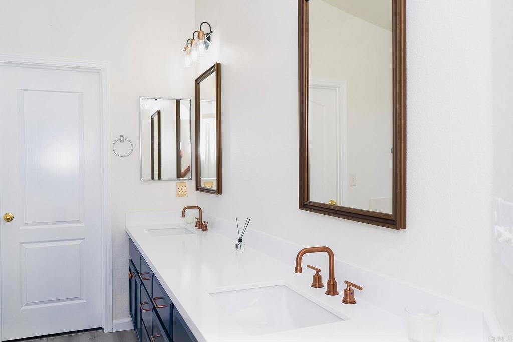 3005 Litt Road Modesto, CA 95355 - Photo 44 of 53 a bathroom with a sink and a mirror