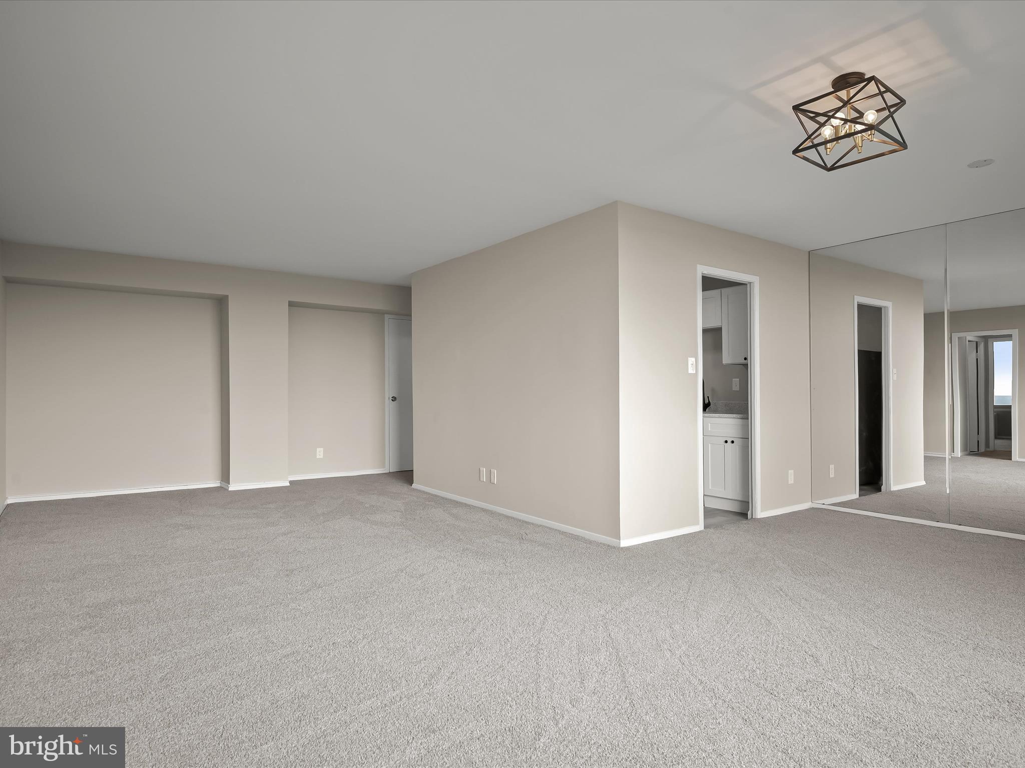 9701 Fields Road, Unit 1607 Gaithersburg, MD 20878 - Photo 13 of 42 a view of an empty room and a window