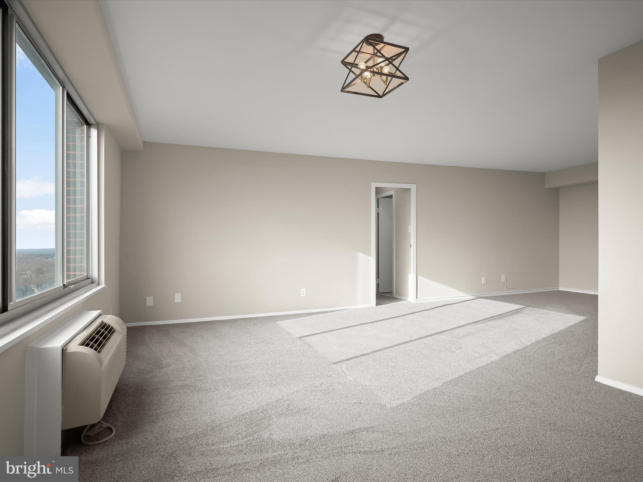 9701 Fields Road, Unit 1607 Gaithersburg, MD 20878 - Photo 37 of 42 a view of an empty room with a window