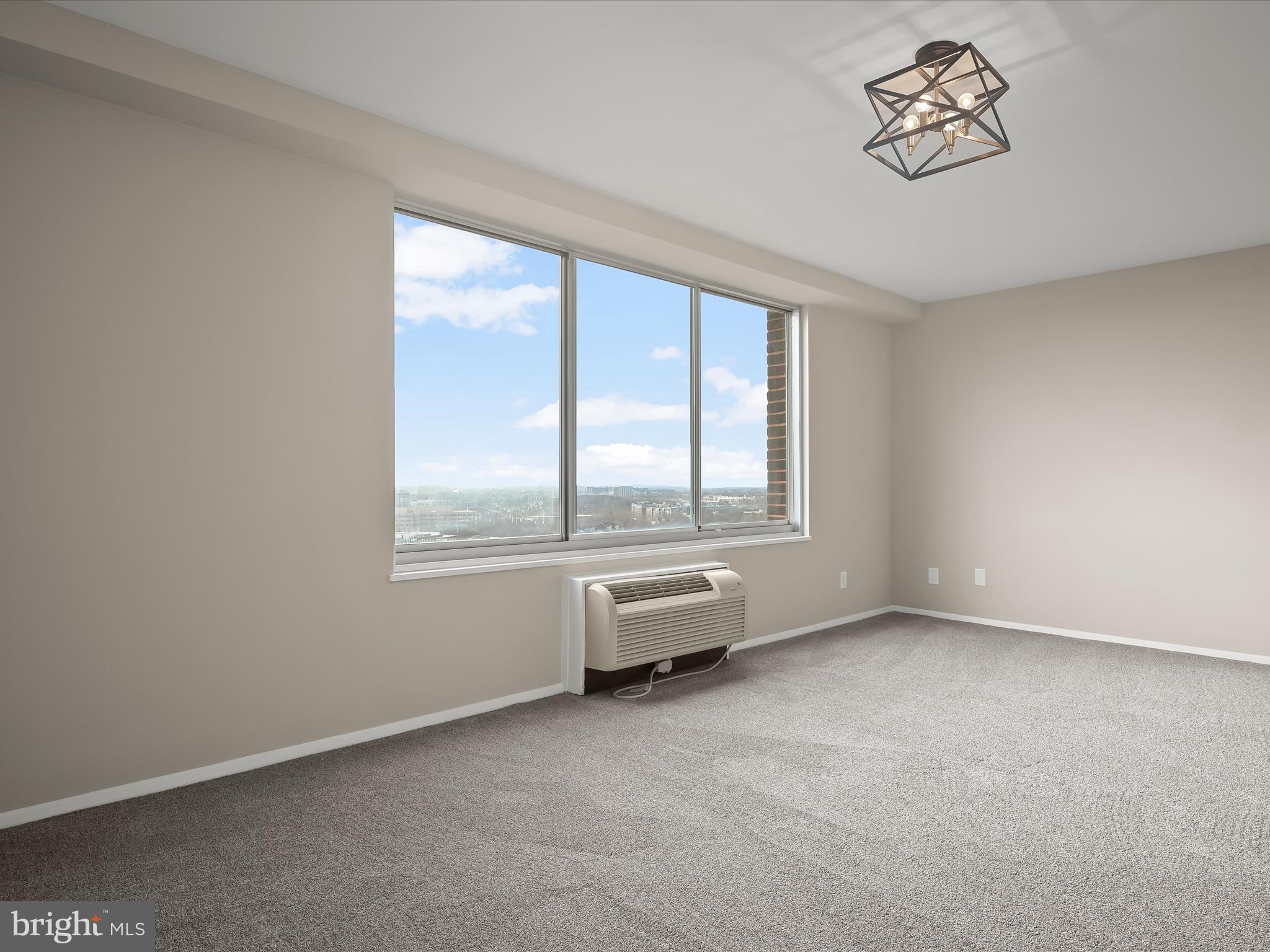 9701 Fields Road, Unit 1607 Gaithersburg, MD 20878 - Photo 15 of 42 an empty room with windows