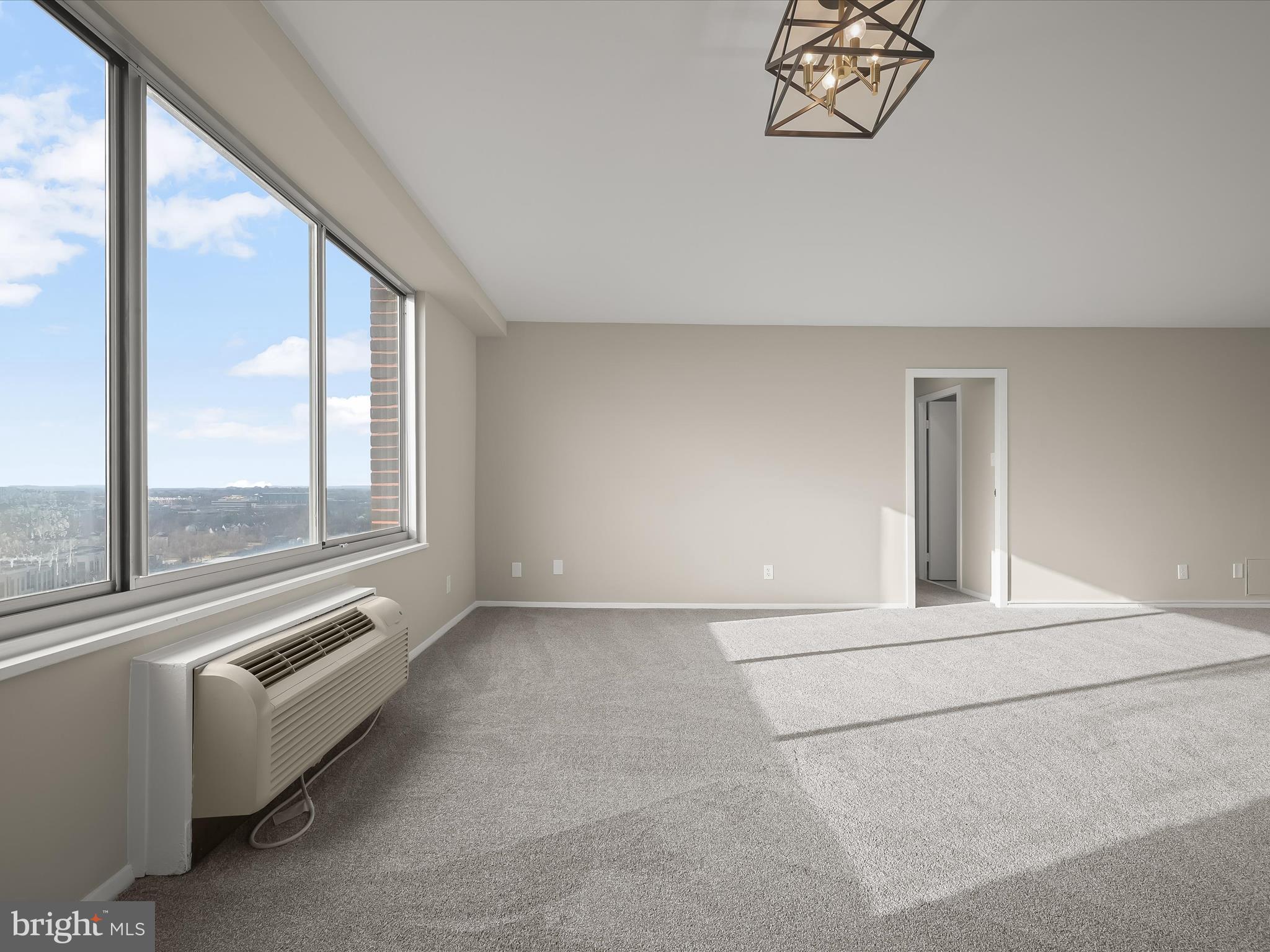 9701 Fields Road, Unit 1607 Gaithersburg, MD 20878 - Photo 39 of 42 a view of an empty room with a window