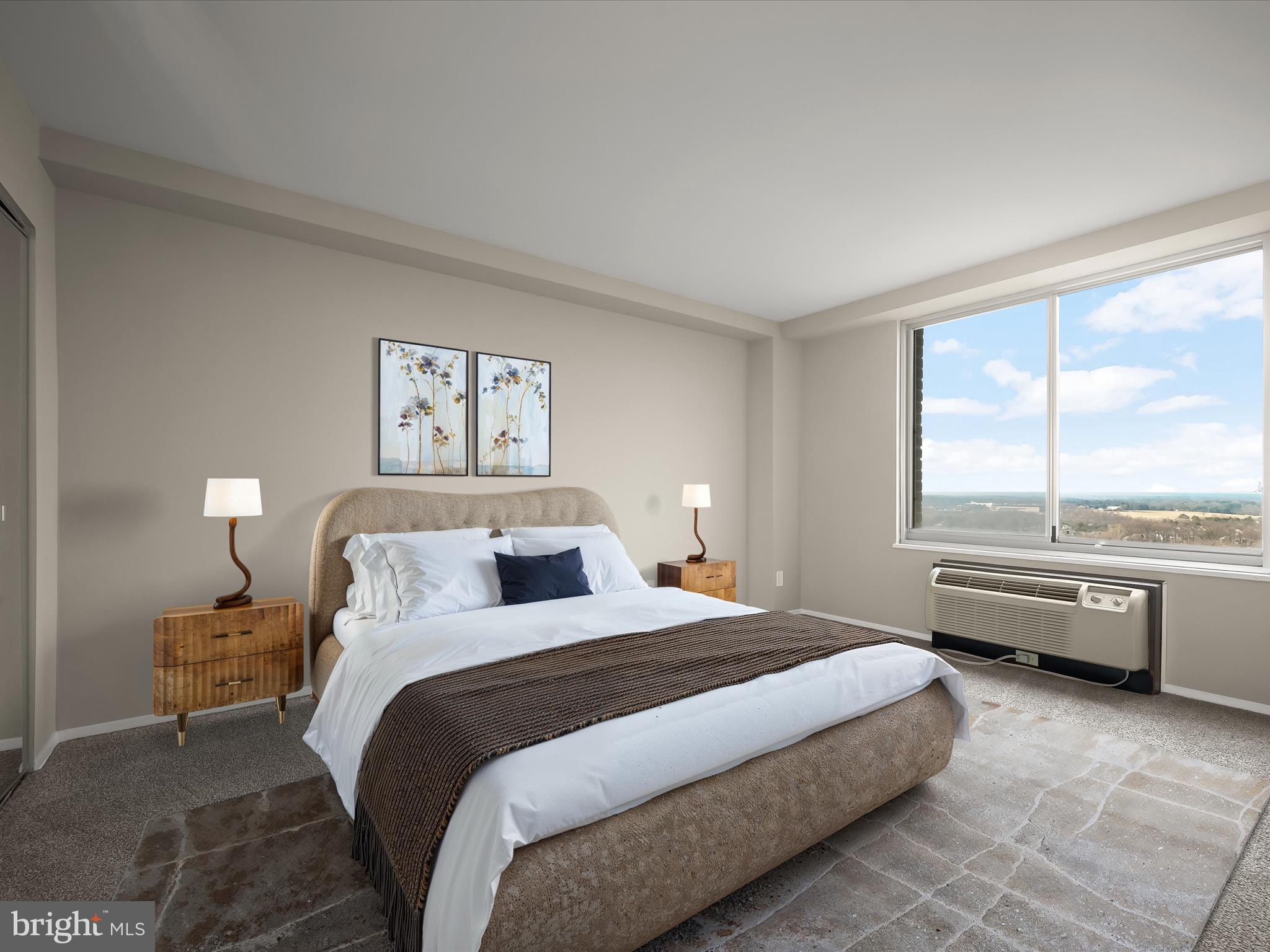 9701 Fields Road, Unit 1607 Gaithersburg, MD 20878 - Photo 16 of 42 a bedroom with a bed and a large window with outer view