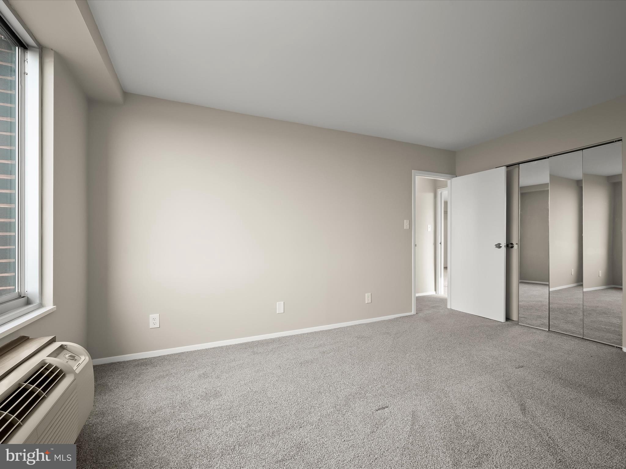 9701 Fields Road, Unit 1607 Gaithersburg, MD 20878 - Photo 18 of 42 a view of an empty room with a window