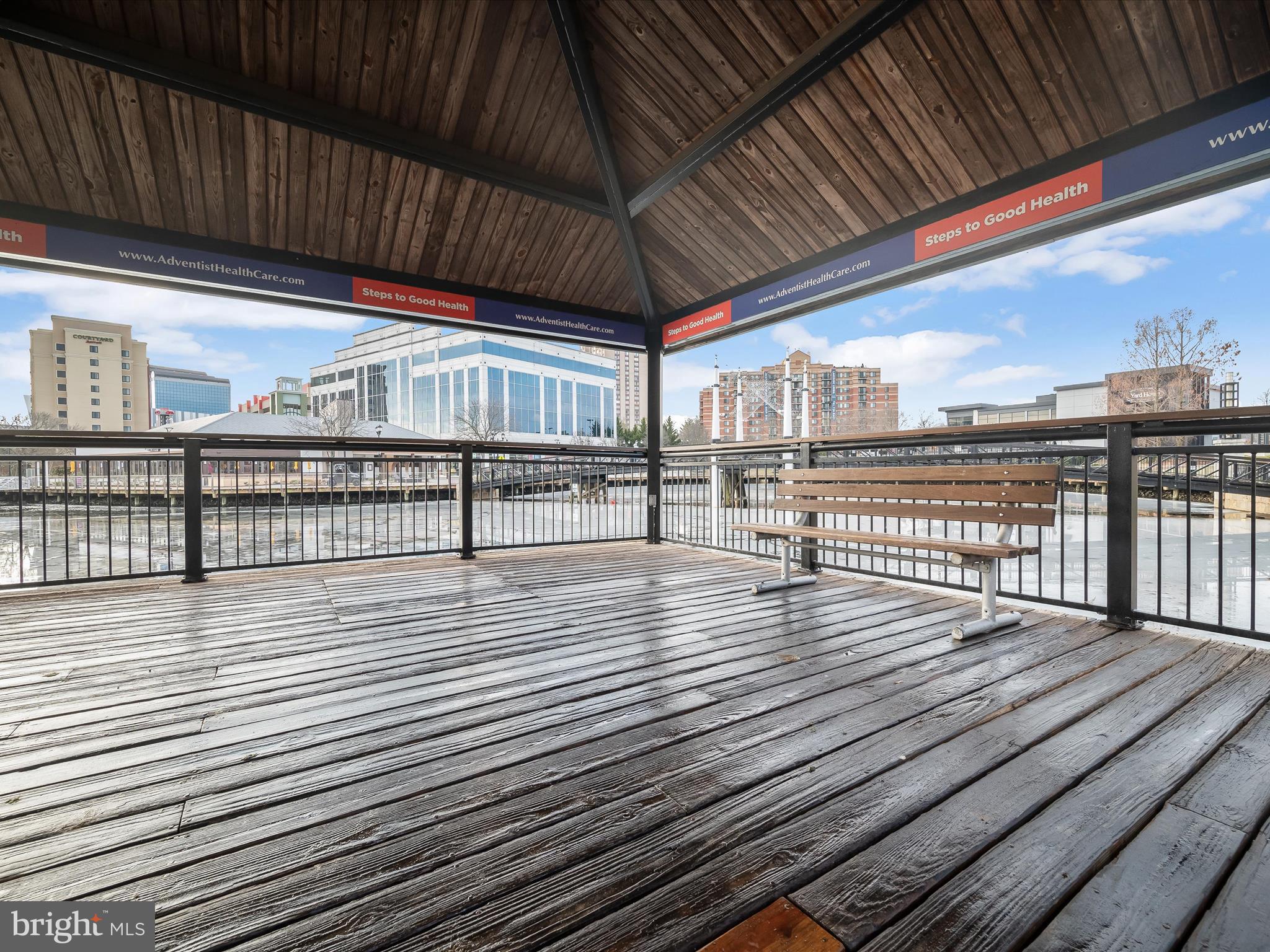 9701 Fields Road, Unit 1607 Gaithersburg, MD 20878 - Photo 32 of 42 a view of outdoor space with wooden deck