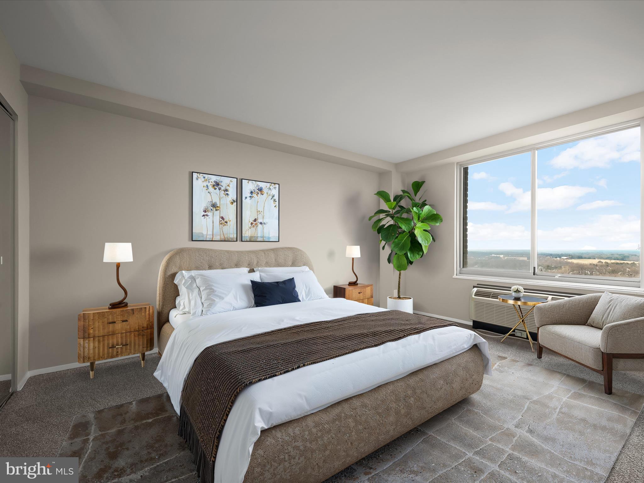 9701 Fields Road, Unit 1607 Gaithersburg, MD 20878 - Photo 3 of 42 a bedroom with a bed and a couch