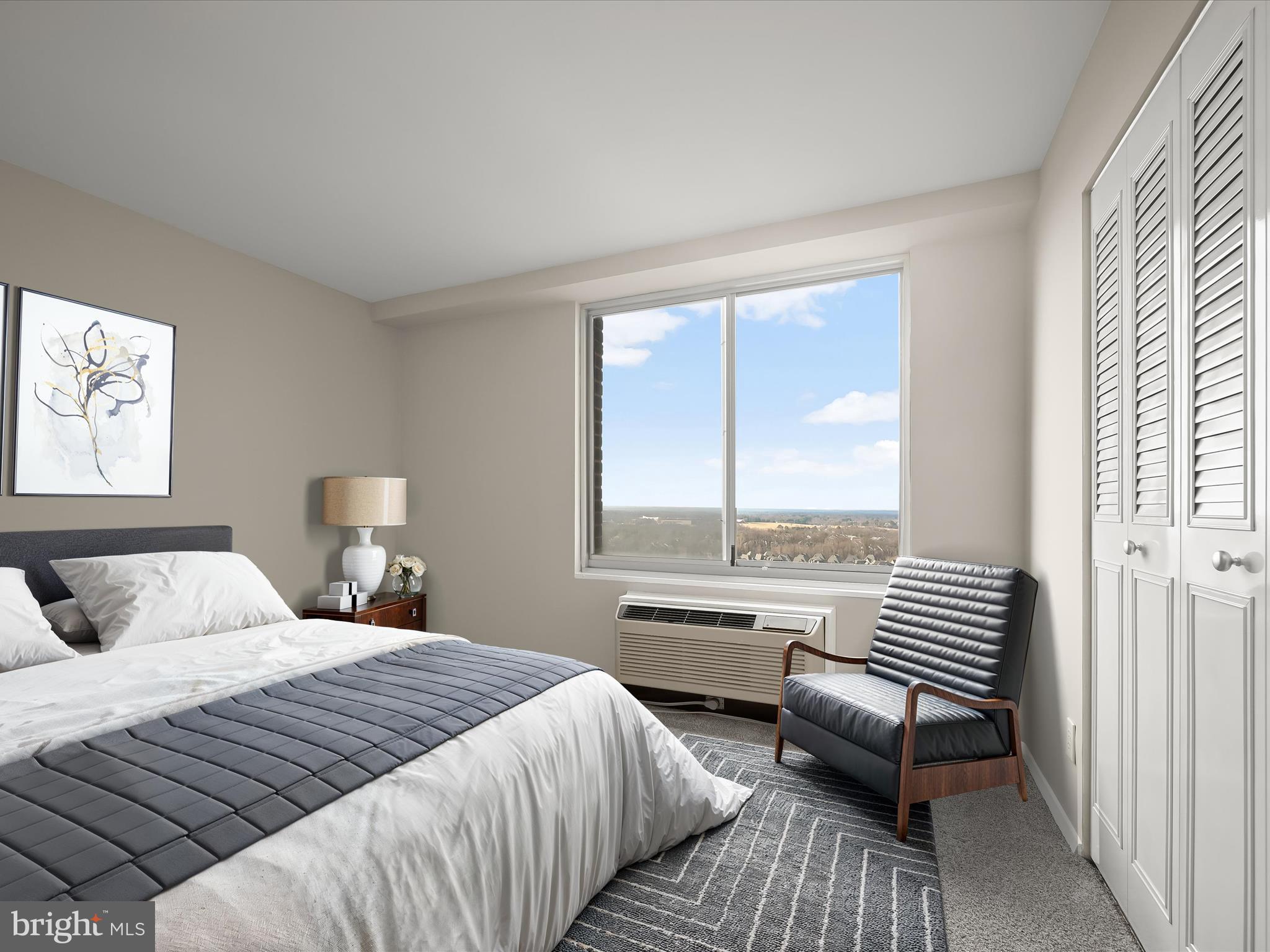 9701 Fields Road, Unit 1607 Gaithersburg, MD 20878 - Photo 4 of 42 a bedroom with a bed and a couch