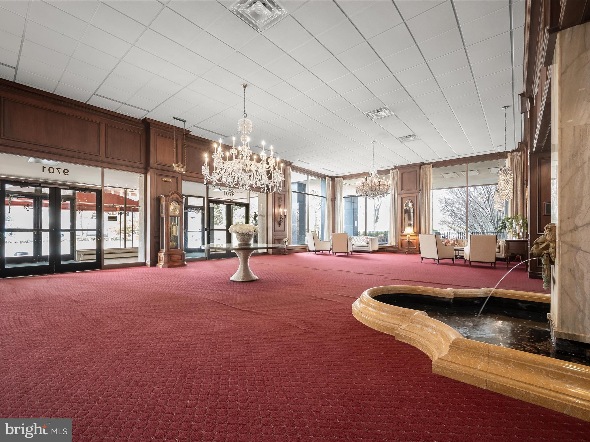 9701 Fields Road, Unit 1607 Gaithersburg, MD 20878 - Photo 6 of 42 a spacious bedroom with a bed and a large window